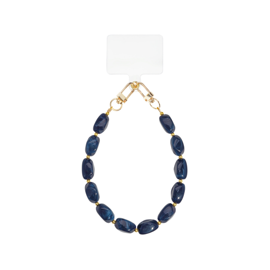 Donkerblauw kralen telefoonkoord met goudkleurige clips en ovale kralen.