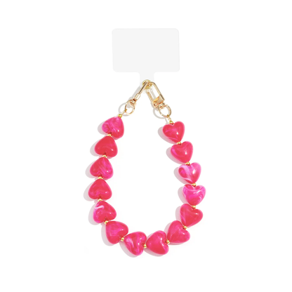 Fuchsia roze marble XL telefoonkoord met grote hartvormige kralen en goudkleurige sluitingen