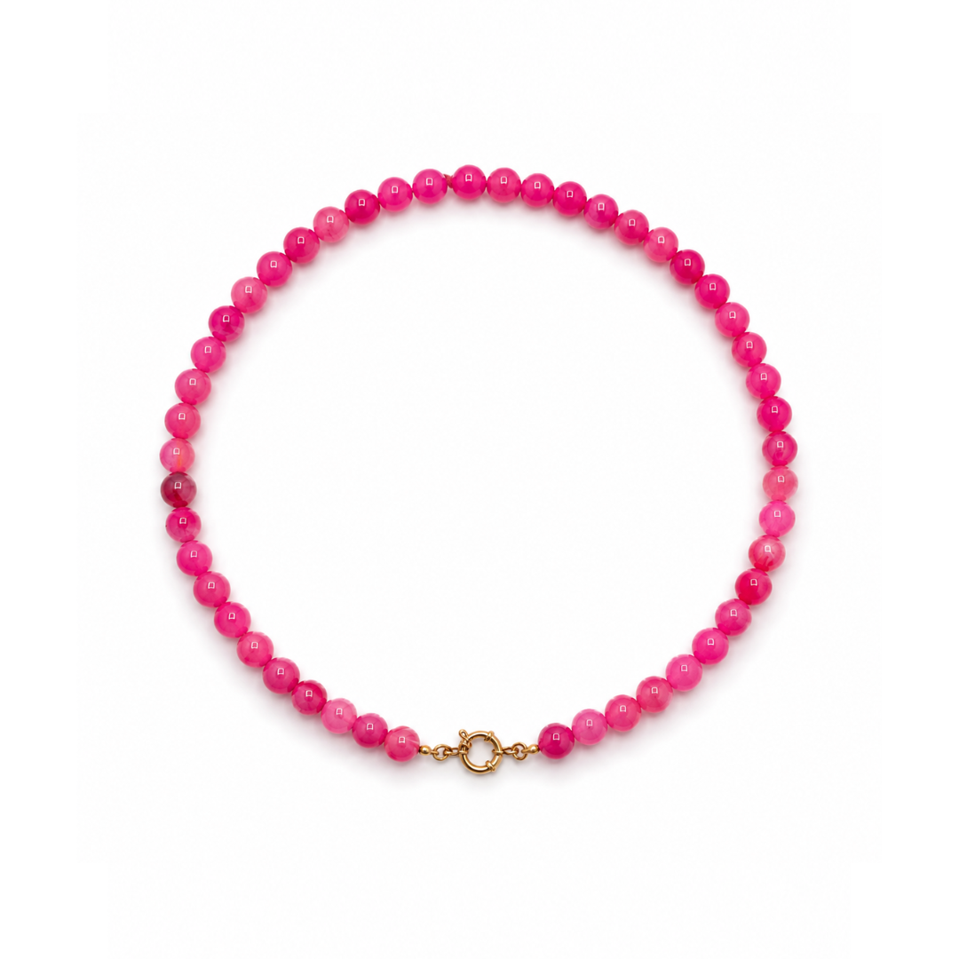 Fuchsia kralenketting met natuursteen-effect en goudkleurig boeislot