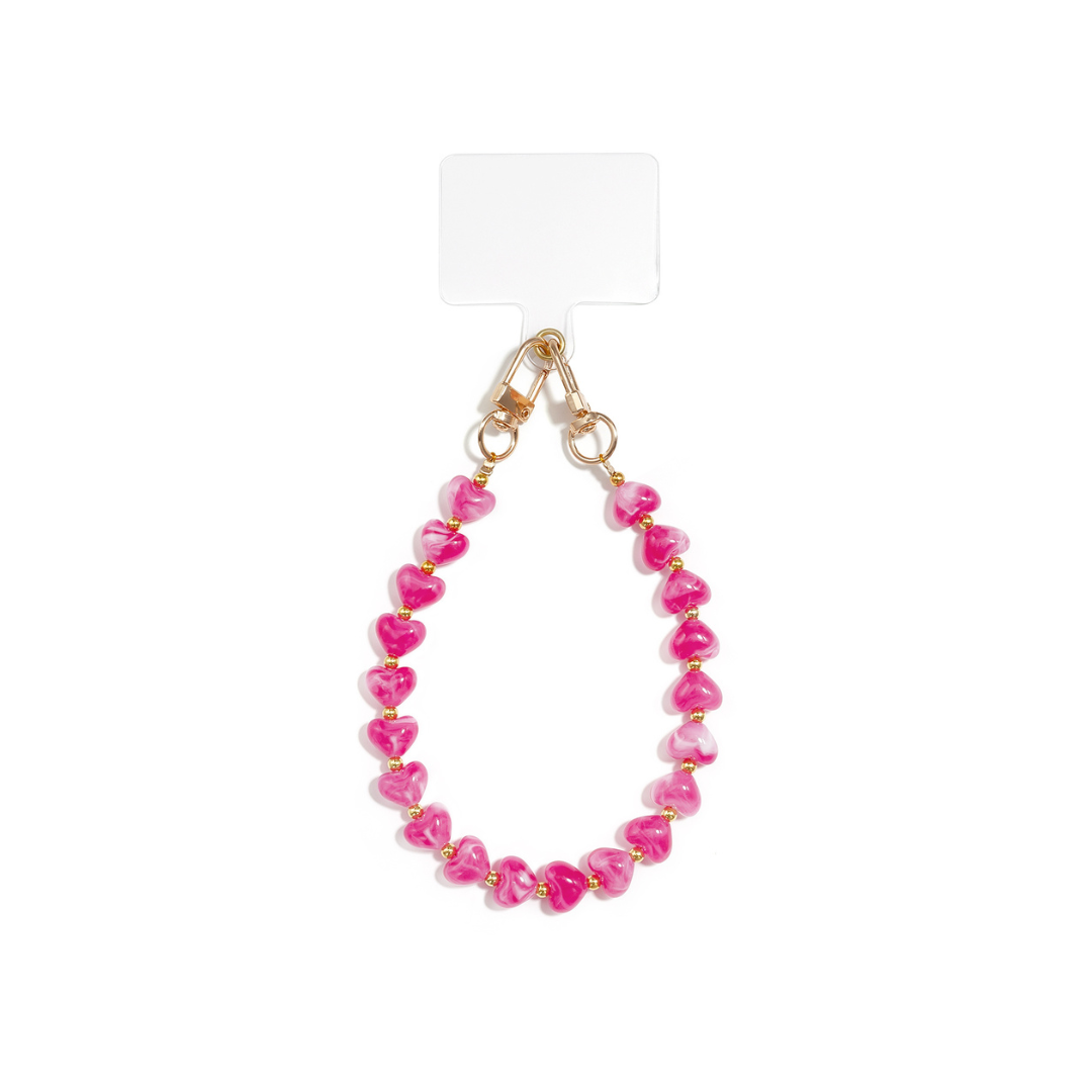 Fuchsia marble hartjes telefoonkoord met glanzende hartjes en goudkleurige details van Casa Jadel.