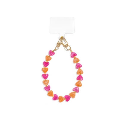 Fuchsia-oranje marble hartjes telefoonkoord met fuchsia en oranje hartjes en goudkleurige details van Casa Jadel.