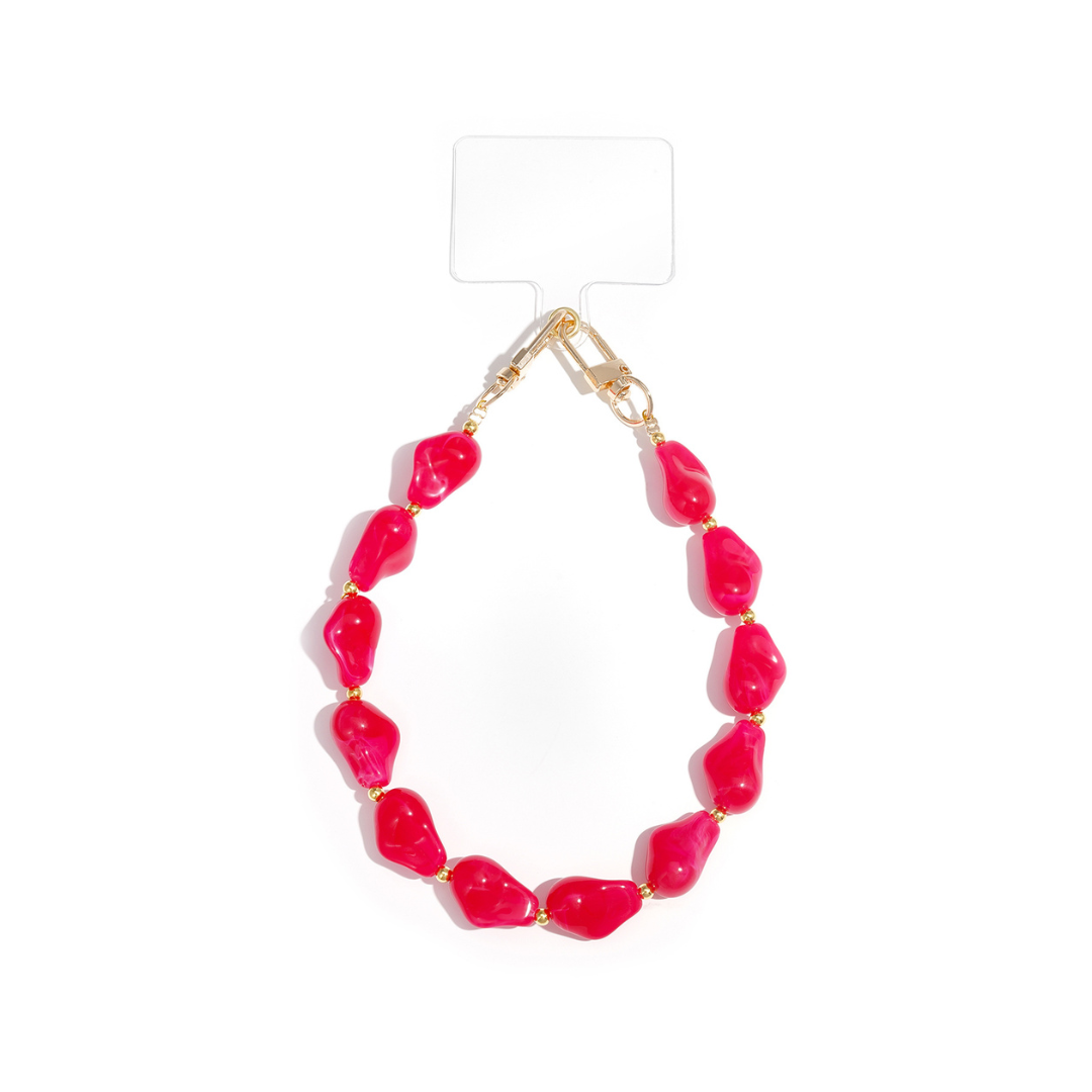 Fuchsia chunky telefoonkoord met marble kralen en gouden sluitingen