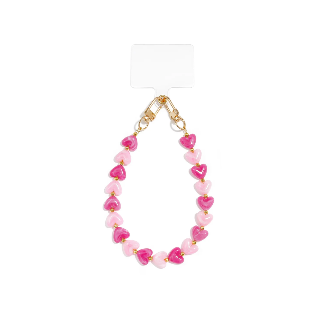 Roze marble hartjes telefoonkoord met lichtroze en fuchsia hartjes en goudkleurige details van Casa Jadel.