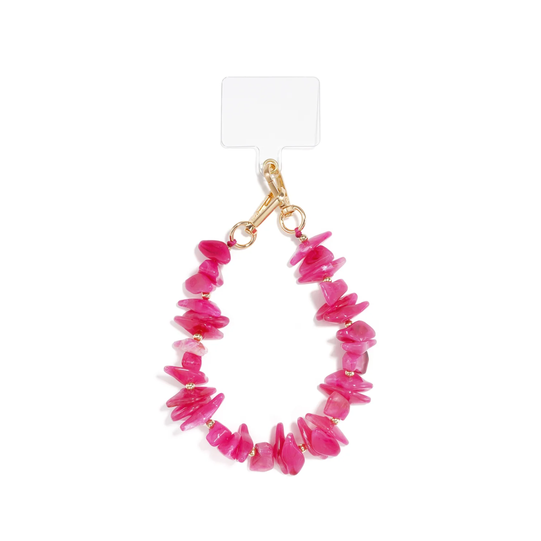 Fuchsia telefoonkoord met chunky natuursteen look kralen en gouden details