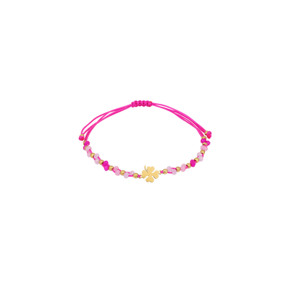 Fuchsia touw armbandje met gouden klavertje, facetkralen en gouden details van Casa Jadel.