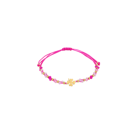 Fuchsia touw armbandje met gouden klavertje, facetkralen en gouden details van Casa Jadel.
