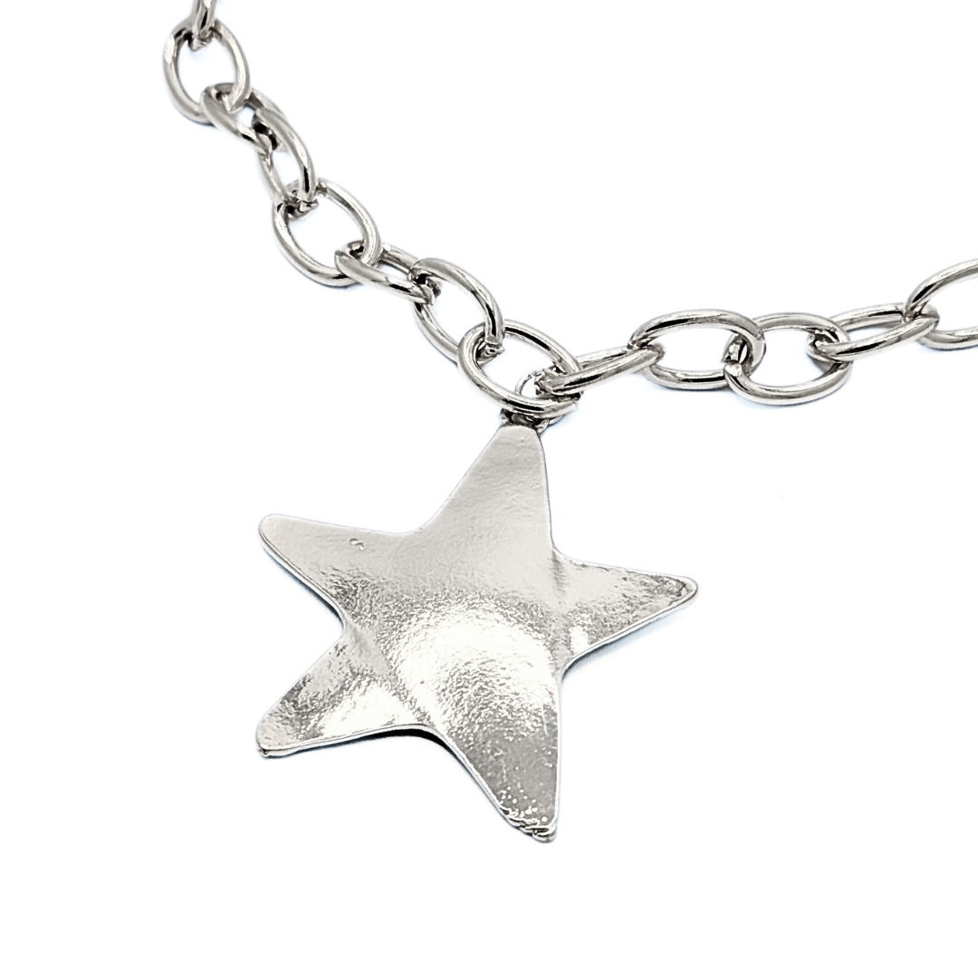 Zilveren schakelketting met grote ster