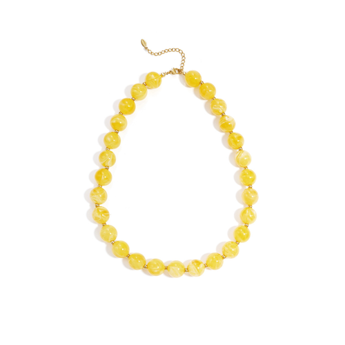 Gele marble grote kralenketting met gouden details Juul