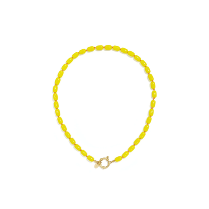 Gele kleine kralenketting met glaskralen en goudkleurig boeislot van Casa Jadel.