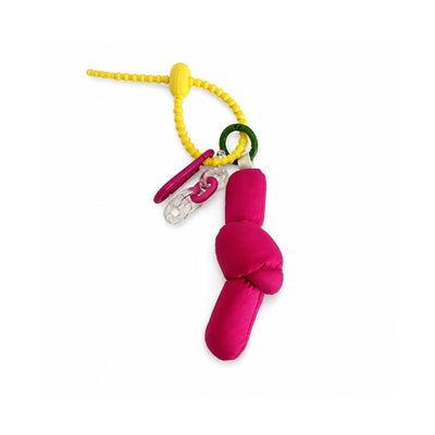 Gele zip-tie tashanger met rode puffy knoop