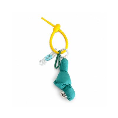Gele zip-tie tashanger met turquoise puffy knoop