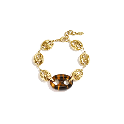 Gouden armband met grote amber bruine panter bean van Casa Jadel