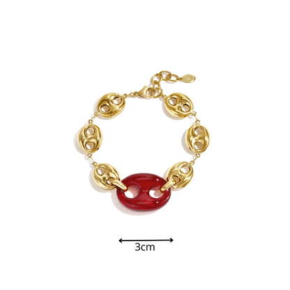 Gouden armband met grote burgundy panter bean van Casa Jadel afmeting