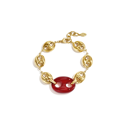 Gouden armband met grote burgundy panter bean van Casa Jadel