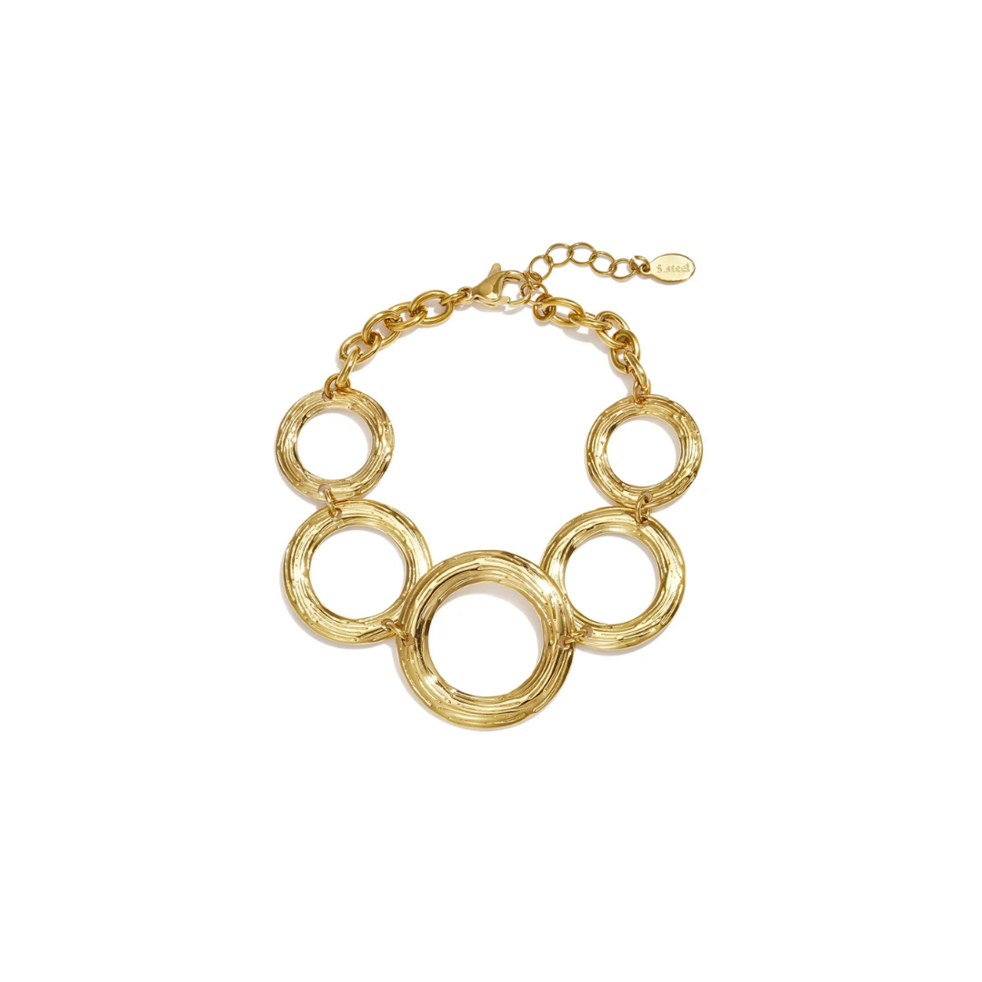 Gouden statement armband met vijf grote open cirkels en chunky schakels