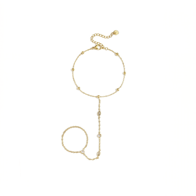 Gouden hand chain armband met ring en ovale steentjes