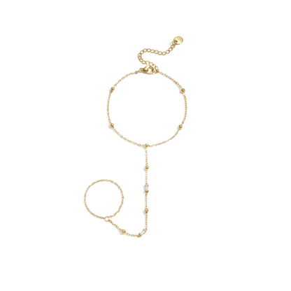 Gouden hand chain van stainless steel met bolletjes en subtiele strass steentjes.