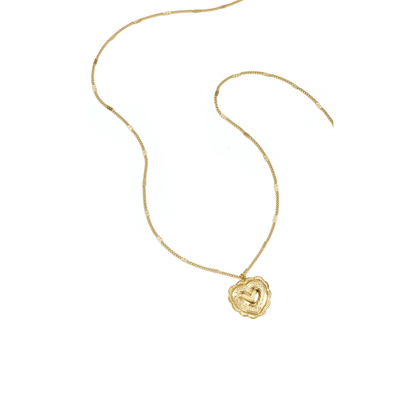 Lange gouden schakelketting met reliëf hartje