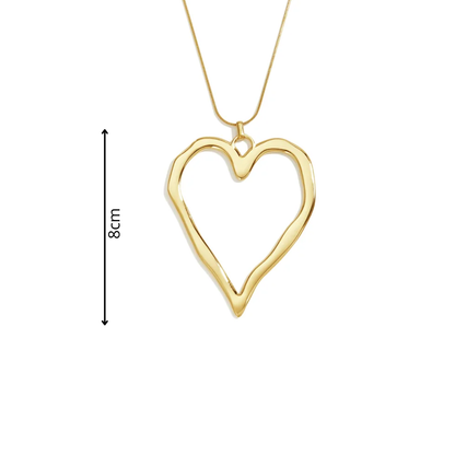 Gouden lange ketting met groot open statement hart in organische vorm afmeting
