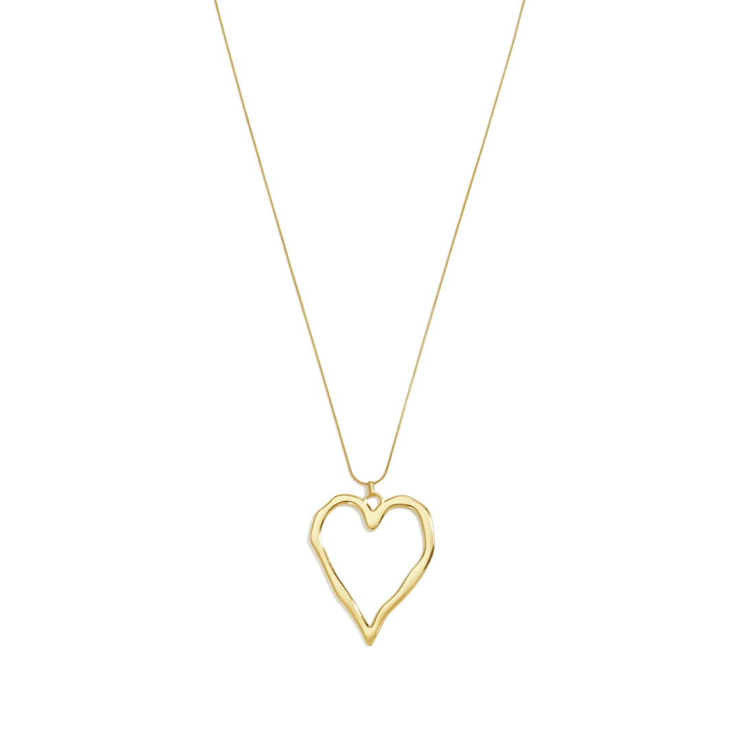 Gouden lange ketting met groot open statement hart in organische vorm