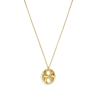 Gouden lange ketting met statement bean bedel