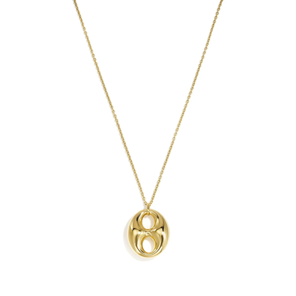 Draag deze lange ketting over een basic top en combineer met een korte gouden ketting voor een sterke layered look.