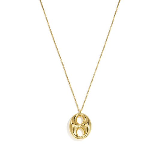 Draag deze lange ketting over een basic top en combineer met een korte gouden ketting voor een sterke layered look.