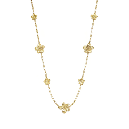 Gouden lange ketting met grote en kleine statement bloemen