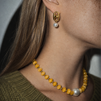 Gele donut kralenketting met grote parel