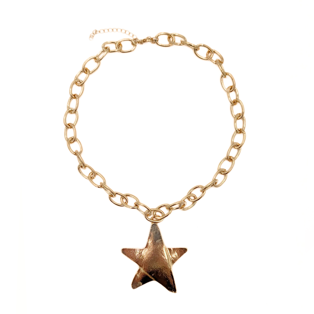 Gouden schakelketting met grote ster hanger
