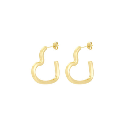 Gouden statement oorbellen in open hartvorm met chunky afgerond design van Casa Jadel.
