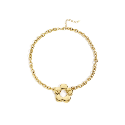 gouden schakelketting met statement bloem