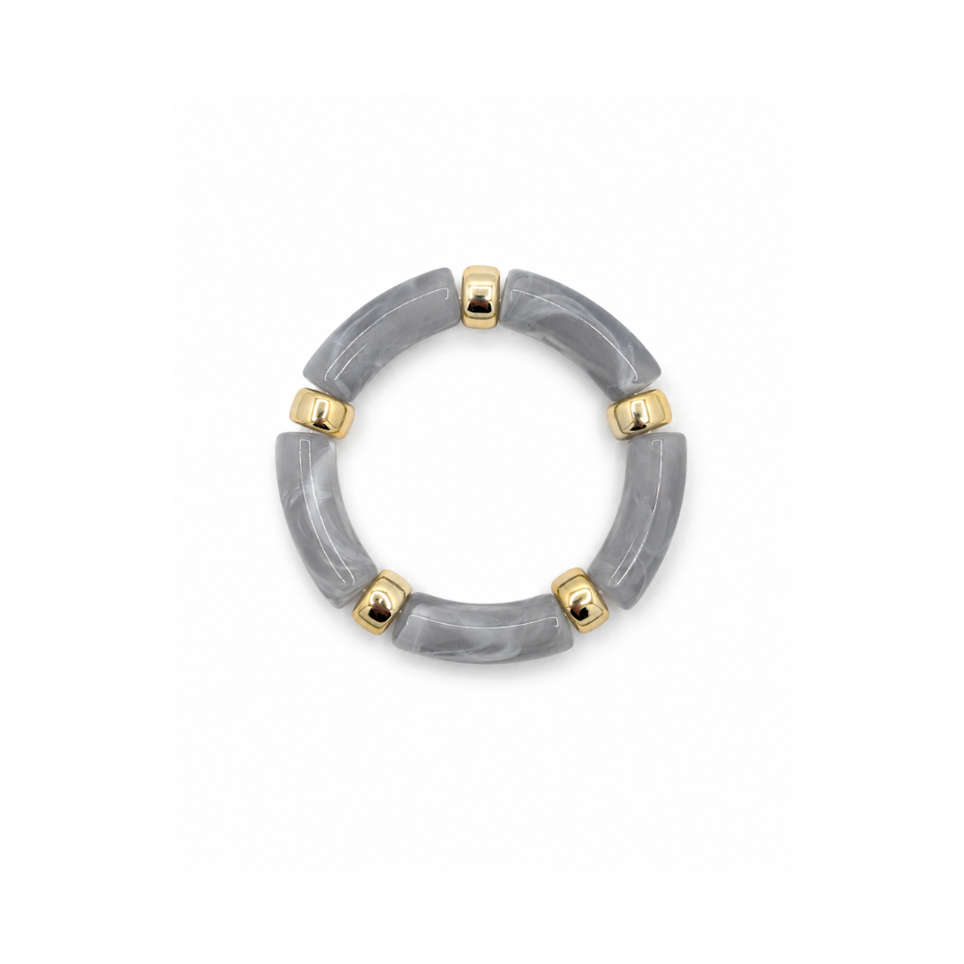 Grijze tube armband met marble tubes en goudkleurige details.