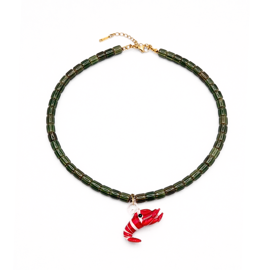 Groene kralenketting met glazen rode garnaal hanger
