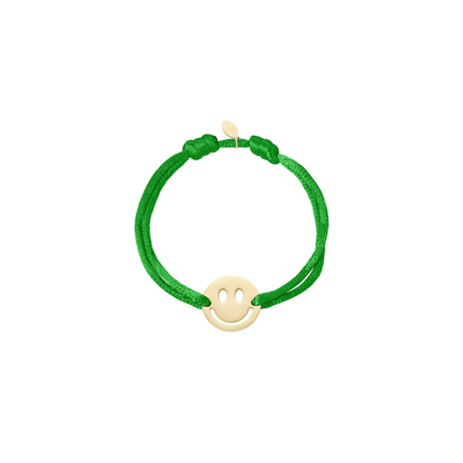 Groene satijnkoord armband met grote gouden smiley