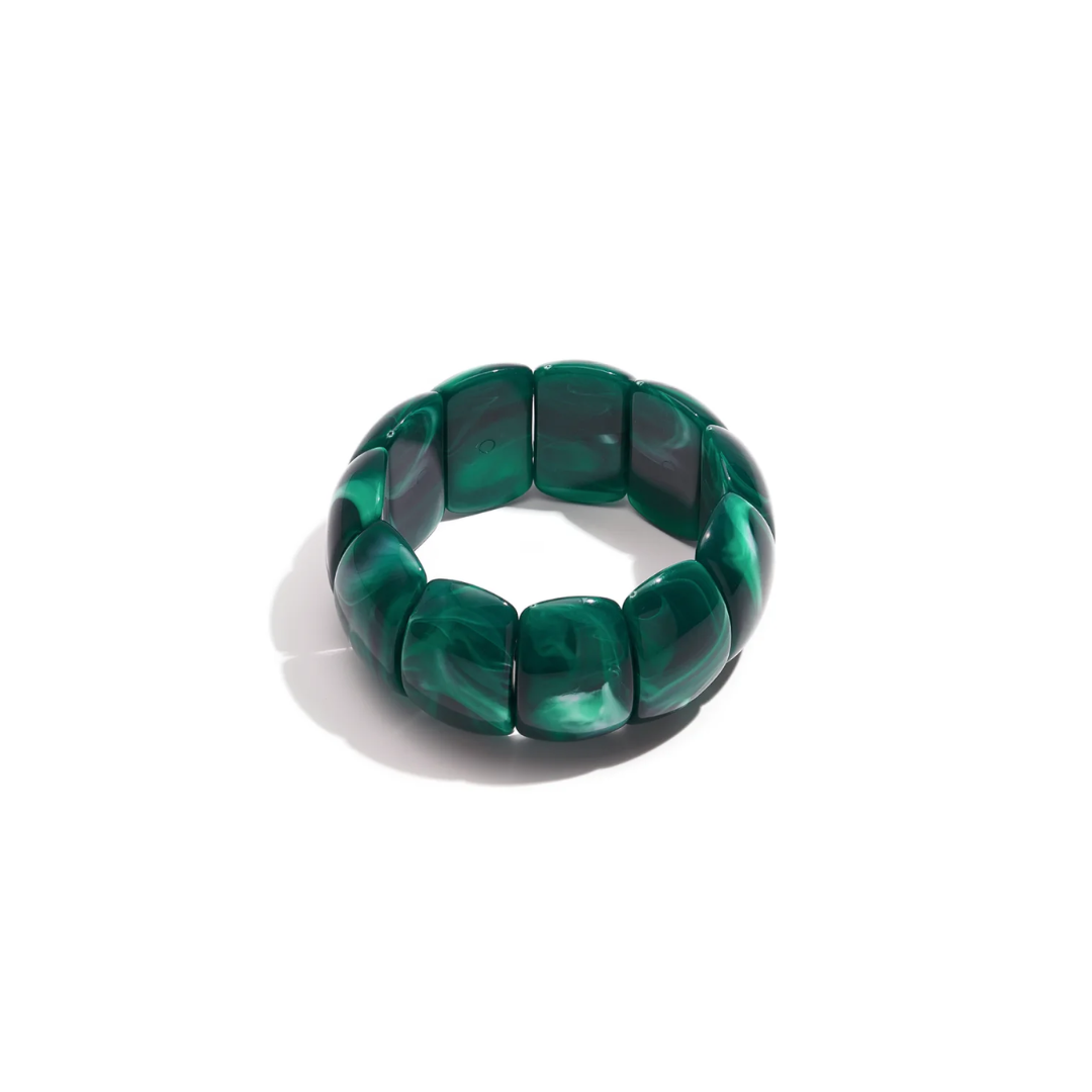 Groene statement armband met grote brede gemêleerde kralen