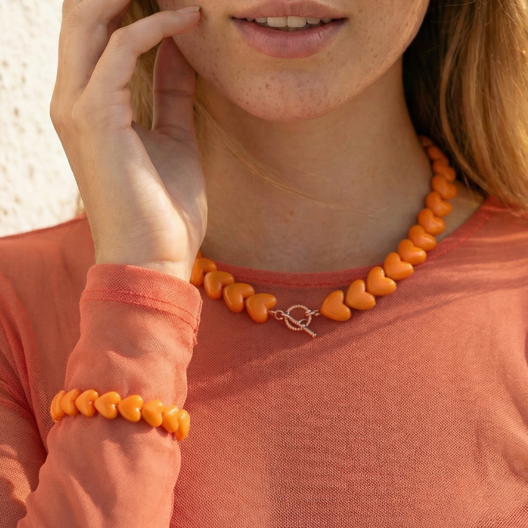 Oranje hartjes kralenset met armband en ketting met frontsluiting