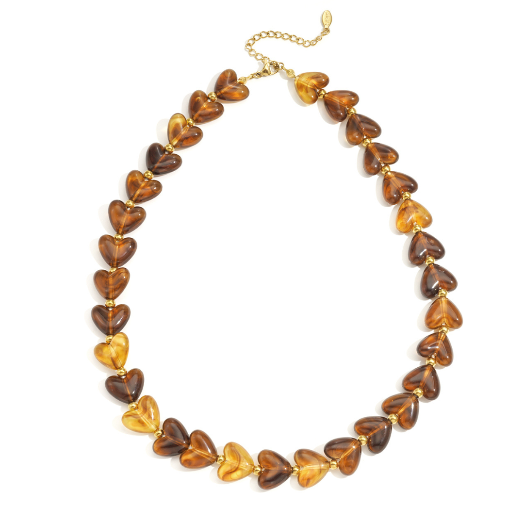 Kralen ketting hartje gemarmerd amber
