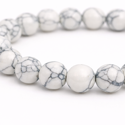 Howliet natuursteen kralenarmband detail dames met wit marmer effect Casa Jadel