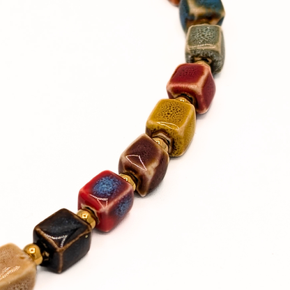 Ibiza style kralenketting met keramiek en hart hanger