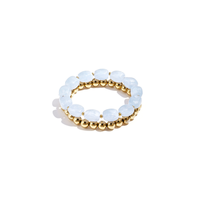 Lichtblauwe kralen armbandenset met gouden kralen