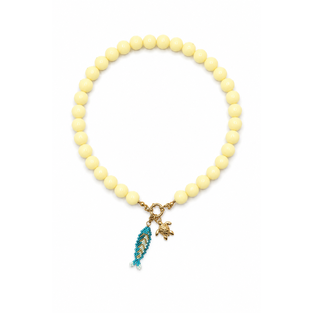 lichtgele ketting met vis en schildpad bedel