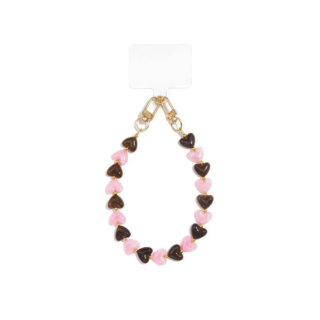 roze bruine marble hartjes telefoonkoord met ambergele en donkerbruine hartjes en goudkleurige details van Casa Jadel