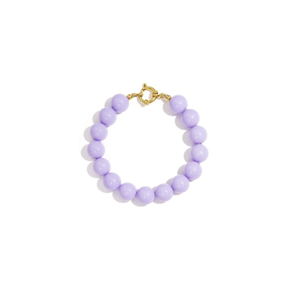 Lila kralenarmband met goudkleurig boeislot in Ibiza style