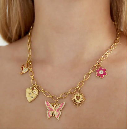 Schakelketting goud met 5 bedels met roze vlinder met strass in het midden - Casa Jadel