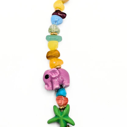 Statement kralenketting met pastelkralen en bedels