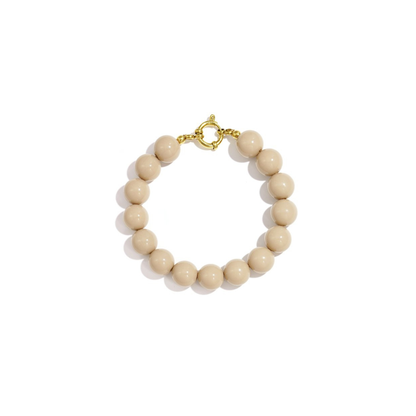Natural kralenarmband met goudkleurig boeislot in Ibiza style