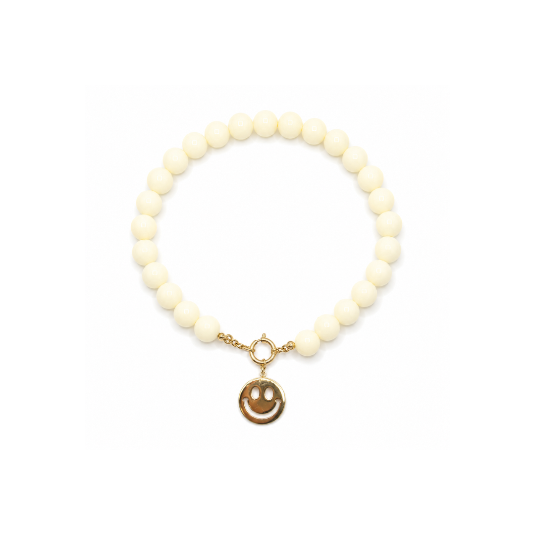 Offwhite kralenketting met gouden smiley bedel van Casa Jadel