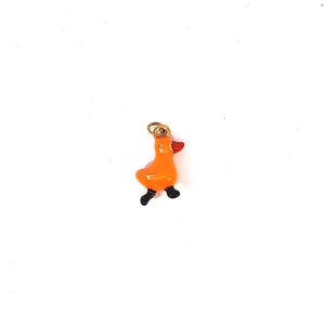 Oranje eend bedel met zwarte pootjes en goudkleurig oogje
