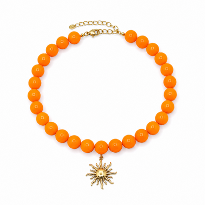 Oranje grote kralenketting met gouden zon bedel van Casa Jadel
